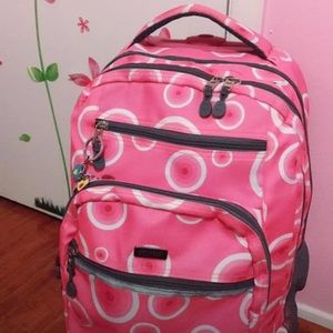 School roller back pack in pink new 95%